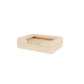 En beige hundbädd.