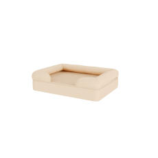 En beige hundbädd.
