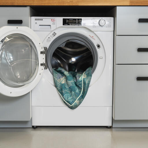 Grönt Omlet hundbäddsöverdrag i tvättmaskinen